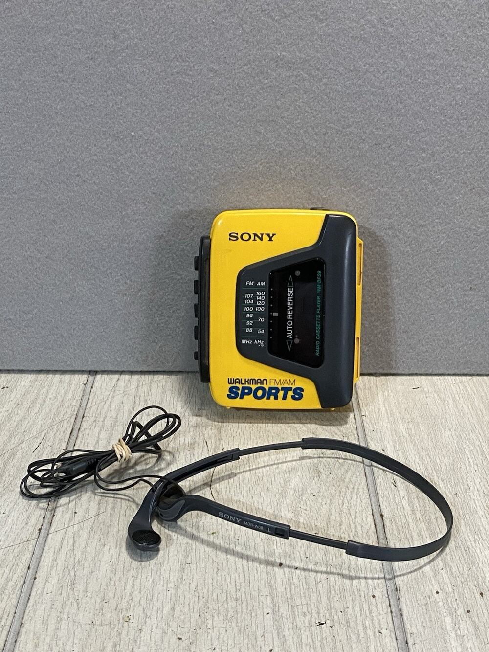 Vintage Sony WM-AF54 WalkMan Sport Radio Cassette Player Portable Yellow WORKS